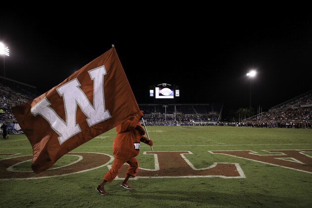 BOCA RATON, FL - DECEMBER 20: The Western Kentucky Hilltoppers mascot Big Red carries a flag during the game against the Memphis Tigers at FAU Stadium on December 20, 2016 in Boca Raton, Florida. (Photo by Rob Foldy/Getty Images)