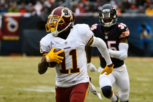 CHICAGO, IL - DECEMBER 24:   DeSean Jackson #11 of the Washington Redskins carries the football ahead of  Johnthan Banks #35 of the Chicago Bears in the first quarter at Soldier Field on December 24, 2016 in Chicago, Illinois.  (Photo by David Banks/Getty Images)