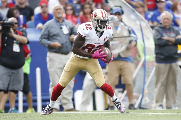 ORCHARD PARK, NY - OCTOBER 15: Torrey Smith #82 of the San Francisco 49ers runs to the end zone after making a reception on a 53-yard pass play during the game against the Buffalo Bills at New Era Field on October 16, 2016 in Orchard Park, New York. The Bills defeated the 49ers 45-16. (Photo by Michael Zagaris/San Francisco 49ers/Getty Images)