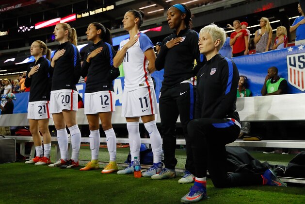 ATLANTA, GA - SEPTEMBER 18:  Megan Rapinoe #15 kneels during the National Anthem prior to the match between the United States and the Netherlands at Georgia Dome on September 18, 2016 in Atlanta, Georgia.  (Photo by Kevin C. Cox/Getty Images)
