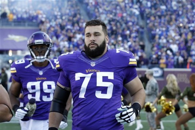 Minnesota Vikings tackle Matt Kalil (75) runs onto the field before an NFL football game against the St. Louis Rams, Sunday, Nov. 8, 2015, in Minneapolis. (AP Photo/Ann Heisenfelt)