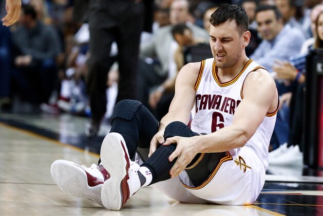 CLEVELAND, OH - MARCH 06: Andrew Bogut #6 of the Cleveland Cavaliers reacts after getting hurt in the first half while playing the Miami Heat at Quicken Loans Arena on March 6, 2017 in Cleveland, Ohio. NOTE TO USER: User expressly acknowledges and agrees that, by downloading and or using this photograph, User is consenting to the terms and conditions of the Getty Images License Agreement.  (Photo by Gregory Shamus/Getty Images)