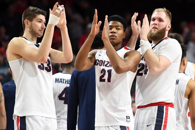 LAS VEGAS, NV - MARCH 04:  Killian Tillie #33, Rui Hachimura #21 and Przemek Karnowski #24 of the Gonzaga Bulldogs celebrate on the court after defeating the Pacific Tigers 82-50 in a quarterfinal game of the West Coast Conference Basketball Tournament at the Orleans Arena on March 4, 2017 in Las Vegas, Nevada.  (Photo by Ethan Miller/Getty Images)