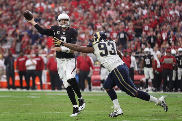 GLENDALE, AZ - OCTOBER 02: Quarterback Carson Palmer #3 of the Arizona Cardinals makes a pass in front of defensive tackle Ethan Westbrooks #93 of the Los Angeles Rams during the second half of the NFL game at the University of Phoenix Stadium on October 2, 2016 in Glendale, Arizona. The Rams defeated the Cardinals 17-13. (Photo by Christian Petersen/Getty Images)