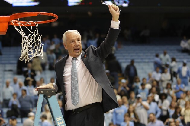 CHAPEL HILL, NC - MARCH 04:  Head coach Roy Williams of the North Carolina Tar Heels celebrates as he cuts down the net after defeating the Duke Blue Devils 90-83 to clinch the ACC regular season title at the Dean Smith Center on March 4, 2017 in Chapel Hill, North Carolina.  (Photo by Streeter Lecka/Getty Images)