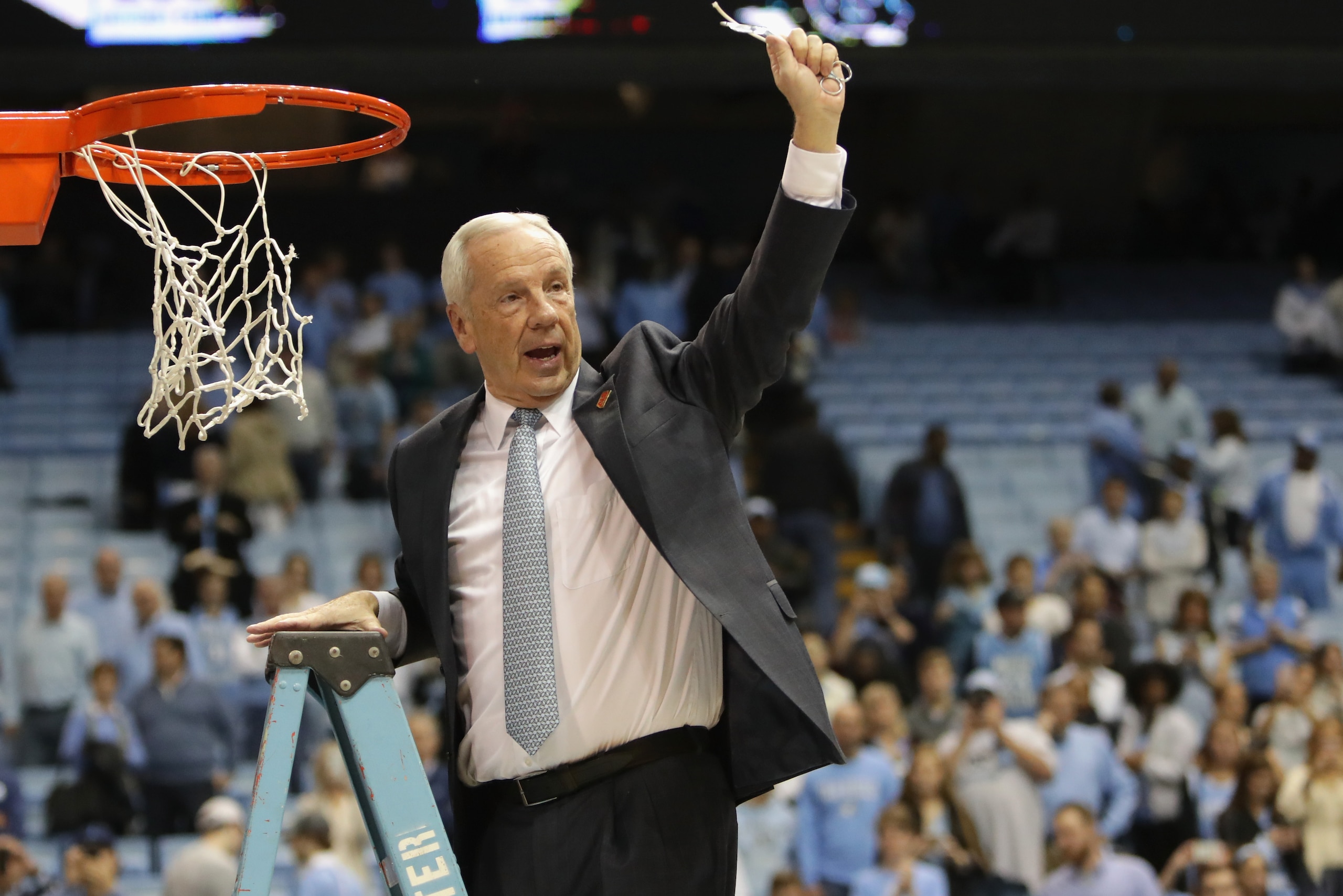 CHAPEL HILL, NC - MARCH 04:  Head coach Roy Williams of the North Carolina Tar Heels celebrates as he cuts down the net after defeating the Duke Blue Devils 90-83 to clinch the ACC regular season title at the Dean Smith Center on March 4, 2017 in Chapel Hill, North Carolina.  (Photo by Streeter Lecka/Getty Images)