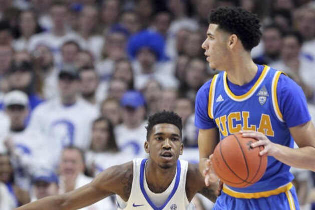 UCLA's Lonzo Ball, right, looks for a teammate while guarded by Kentucky's Malik Monk (5) during the first half of an NCAA college basketball game, Saturday, Dec. 3, 2016, in Lexington, Ky. (AP Photo/James Crisp) UCLA's Lonzo Ball, right, looks for a teammate while guarded by Kentucky's Malik Monk (5) during the first half of an NCAA college basketball game, Saturday, Dec. 3, 2016, in Lexington, Ky. (AP Photo/James Crisp)