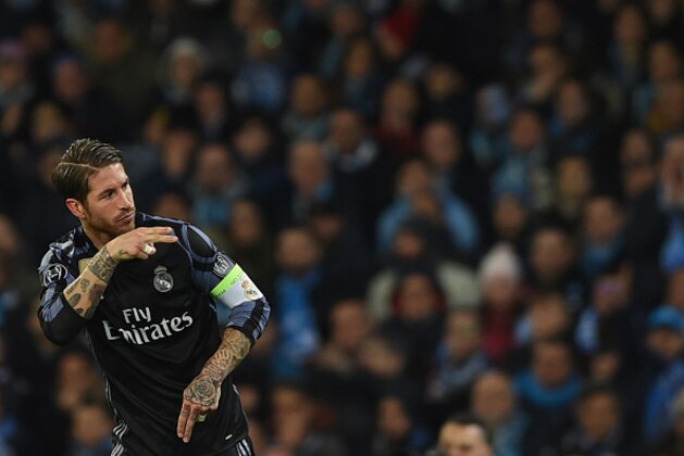 Real Madrid's defender Sergio Ramos celebrates after scoring during the UEFA Champions League football match SSC Napoli vs Real Madrid on March 7, 2017 at the San Paolo stadium in Naples. / AFP PHOTO / Filippo MONTEFORTE (Photo credit should read FILIPPO MONTEFORTE/AFP/Getty Images) Real Madrid's defender Sergio Ramos celebrates after scoring during the UEFA Champions League football match SSC Napoli vs Real Madrid on March 7, 2017 at the San Paolo stadium in Naples. / AFP PHOTO / Filippo MONTEFORTE (Photo credit should read FILIPPO MONTEFORTE/AFP/Getty Images)