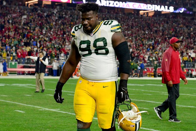 GLENDALE, AZ - JANUARY 16:  Defensive end Letroy Guion #98 of the Green Bay Packers walks off the field after losing in overtime to the Arizona Cardinals 26-20  in the NFC Divisional Playoff Game at University of Phoenix Stadium on January 16, 2016 in Glendale, Arizona.  (Photo by Jennifer Stewart/Getty Images)