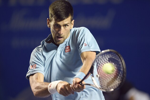 TOPSHOT - Serbia's Novak Djokovic returns the ball to Australia's Nick Kyrgios during the fourth day of the Mexican Tennis Open, in Acapulco, Guerrero State, Mexico, on March 2, 2017. / AFP PHOTO / ALFREDO ESTRELLA        (Photo credit should read ALFREDO ESTRELLA/AFP/Getty Images)