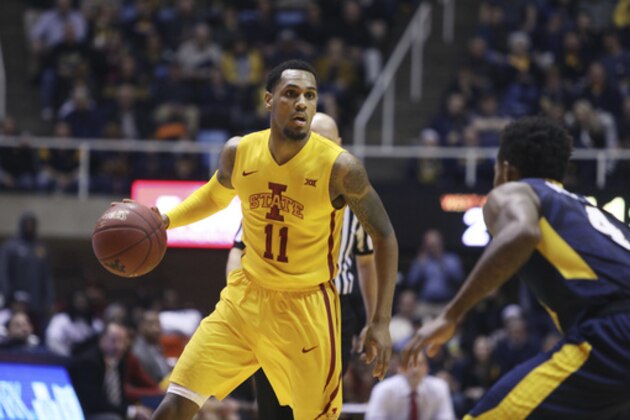 Iowa State guard Monte Morris (11) brings the ball up court during the first half of an NCAA college basketball game, Friday against West Virginia, March 3, 2017, in Morgantown, W.Va. (AP Photo/Raymond Thompson)