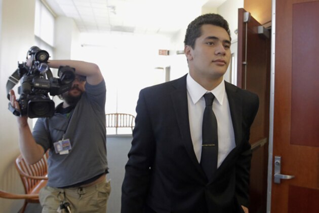 FILE - In this Oct. 14, 2016, file photo, Osa Masina, a suspended Southern California football player charged with rape in Utah, leaves the courtroom in Salt Lake City. Prosecutors in Los Angeles have decided not to file sexual assault charges against Masina, who is awaiting trial on similar charges in Utah. The LA County district attorney's office released documents on the decision Tuesday, March 7, 2017. (AP Photo/Rick Bowmer, File)