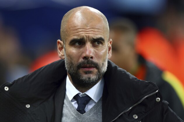 Manchester City's manager Pep Guardiola arrives for the English FA Cup soccer match between Manchester City and Huddersfield Town at the Etihad stadium in Manchester, Wednesday, March 1, 2017.(AP Photo/Dave Thompson)