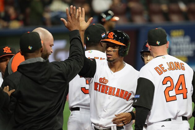 SEOUL, SOUTH KOREA - MARCH 08:  Infielder Xander Bogaerts #1 of the Netherlands celebrates with his team mates after scoring a run by a RBI double of Didi Gregorius #18 to make it 5-5 in the bottom of the eighth inning during the World Baseball Classic Pool A Game Four between Chinese Taipei and Netherlands at Gocheok Sky Dome on March 8, 2017 in Seoul, South Korea.  (Photo by Chung Sung-Jun/Getty Images)
