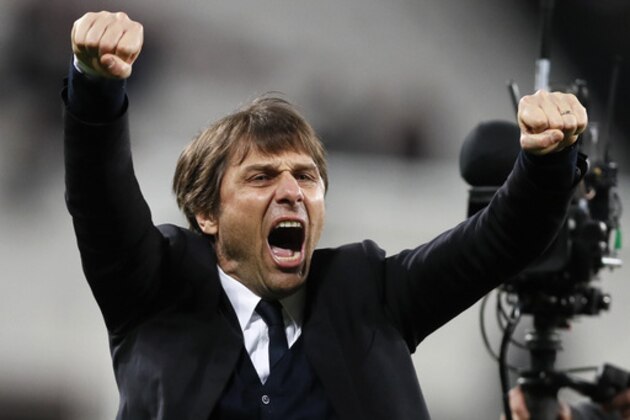 Chelsea manager Antonio Conte celebrates after his team defeated West Ham 2-1 in their English Premier League soccer match at London Stadium, Monday, March 6, 2017. (AP Photo/Kirsty Wigglesworth)