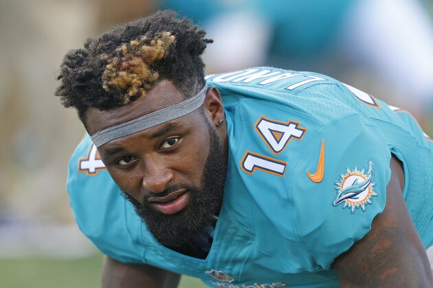 ORLANDO, FL - AUGUST 25: Jarvis Landry #14 of the Miami Dolphins stretches prior to the preseason game against the Atlanta Falcons on August 25, 2016 at Camping World Stadium in Orlando, Florida. The Dolphins defeated the Falcons 17-6. (Photo by Joel Auerbach/Getty Images)