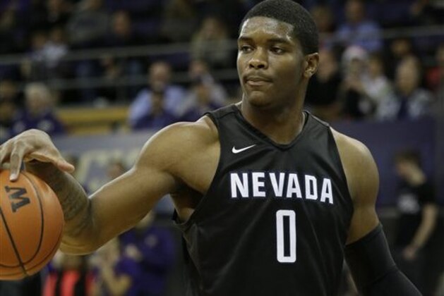 Nevada's Cameron Oliver in action against Washington in an NCAA college basketball game Sunday, Dec. 11, 2016, in Seattle. (AP Photo/Elaine Thompson)