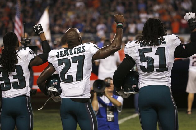 FILE - Int his Monday, Sept. 12, 2016, file photo, San Francisco 49ers safety Eric Reid (35) and quarterback Colin Kaepernick (7) kneel during the national anthem before an NFL football game against the Los Angeles Rams in Santa Clara, Calif. The dozen NFL players who have joined Kaepernick’s protest of social injustices by kneeling or raising a fist during the national anthem have faced vitriolic, sometimes racist reactions on social media and at least one has lost endorsements. None are deterred by the backlash. (AP Photo/Marcio Jose Sanchez, File)