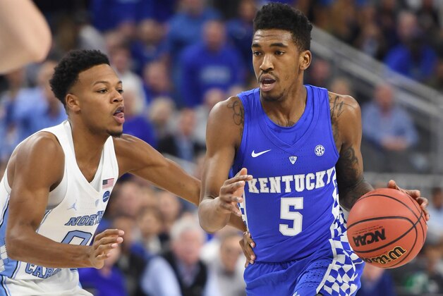 LAS VEGAS, NV - DECEMBER 17:  Malik Monk #5 of the Kentucky Wildcats drives against Nate Britt #0 of the North Carolina Tar Heels during the CBS Sports Classic at T-Mobile Arena on December 17, 2016 in Las Vegas, Nevada. Kentucky won 103-100.  (Photo by Ethan Miller/Getty Images)