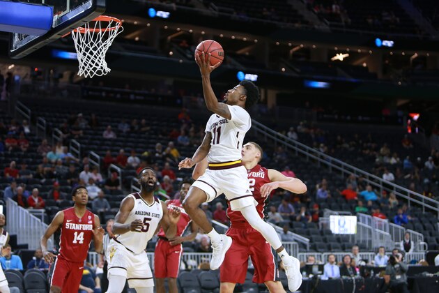 LAS VEGAS, NV - MARCH 08:  Shannon Evans II #11 of the Arizona State Sun Devils goes to the basketl against Reid Travis #22 of the Stanford Cardinal during a first-round game of the Pac-12 Basketball Tournament at T-Mobile Arena on March 8, 2017 in Las Vegas, Nevada.  (Photo by Leon Bennett/Getty Images)