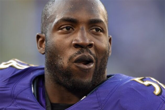 Baltimore Ravens outside linebacker Elvis Dumervil walks on the sideline in the second half an NFL football game against the Jacksonville Jaguars, Sunday, Nov. 15, 2015, in Baltimore. (AP Photo/Nick Wass)