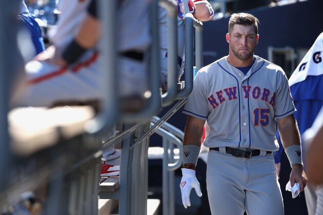 PEORIA, AZ - OCTOBER 13: Tim Tebow #15 (New York Mets) of the Scottsdale Scorpions watches from the dugout during the Arizona Fall League game against the Peoria Javelinas at Peoria Stadium on October 13, 2016 in Peoria, Arizona. (Photo by Christian Petersen/Getty Images) PEORIA, AZ - OCTOBER 13: Tim Tebow #15 (New York Mets) of the Scottsdale Scorpions watches from the dugout during the Arizona Fall League game against the Peoria Javelinas at Peoria Stadium on October 13, 2016 in Peoria, Arizona. (Photo by Christian Petersen/Getty Images)