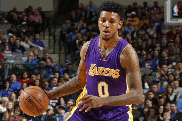 DALLAS, TX - JANUARY 22: Nick Young #0 of the Los Angeles Lakers handles the ball against the Dallas Mavericks on January 22, 2017 at the American Airlines Center in Dallas, Texas. NOTE TO USER: User expressly acknowledges and agrees that, by downloading and or using this photograph, User is consenting to the terms and conditions of the Getty Images License Agreement. Mandatory Copyright Notice: Copyright 2017 NBAE (Photo by Danny Bollinger/NBAE via Getty Images)