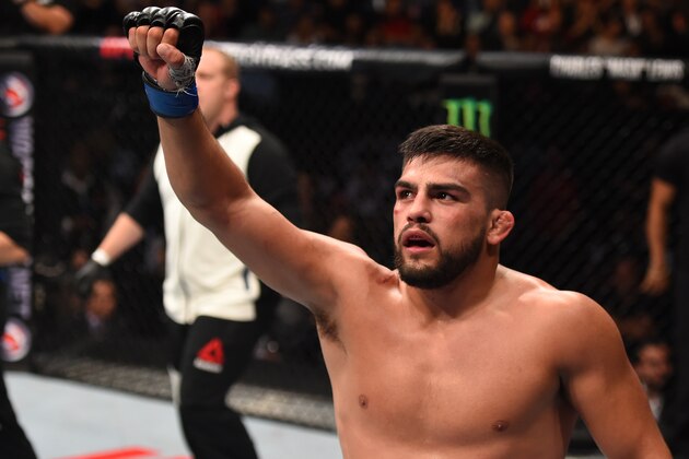 MONTERREY, MEXICO - NOVEMBER 21:  Kelvin Gastelum of the United States celebrates after the conclusion of his welterweight bout against Neil Magny during the UFC Fight Night event at Arena Monterrey on November 21, 2015 in Monterrey, Mexico.  (Photo by Jeff Bottari/Zuffa LLC/Zuffa LLC via Getty Images)