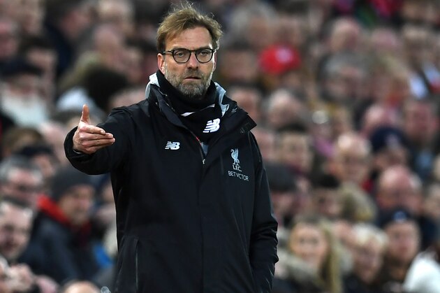 Liverpool's German manager Jurgen Klopp gestures on the touchline during the English Premier League football match between Liverpool and Arsenal at Anfield in Liverpool, north west England on March 4, 2017.  / AFP PHOTO / Paul ELLIS / RESTRICTED TO EDITORIAL USE. No use with unauthorized audio, video, data, fixture lists, club/league logos or 'live' services. Online in-match use limited to 75 images, no video emulation. No use in betting, games or single club/league/player publications.  /         (Photo credit should read PAUL ELLIS/AFP/Getty Images)