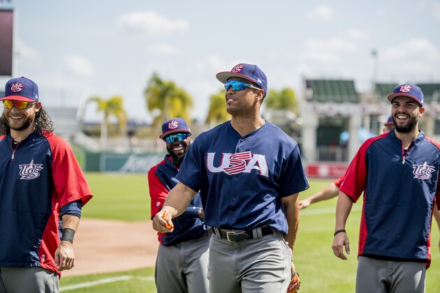 FT. MYERS, FL - MARCH 9: Giancarlo Stanton and Eric Hosmer of Team USA warm up before a Spring Training game against the Boston Red Sox on March 9, 2017 at Fenway South in Fort Myers, Florida . (Photo by Billie Weiss/Boston Red Sox/Getty Images)