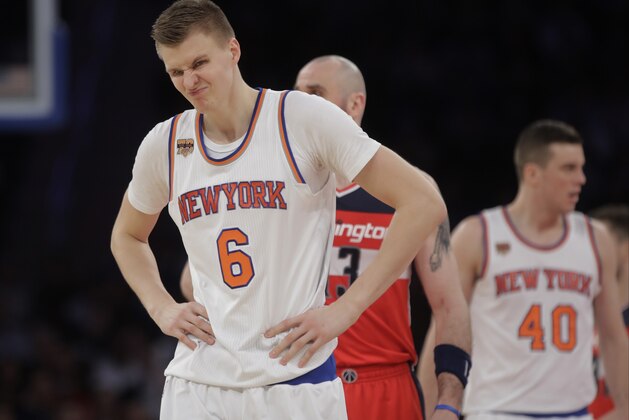 New York Knicks' Kristaps Porzingis (6) reacts to a call during the second half of the team's NBA basketball game against the Washington Wizards on Thursday, Jan. 19, 2017, in New York. The Wizards won 113-110. (AP Photo/Frank Franklin II)