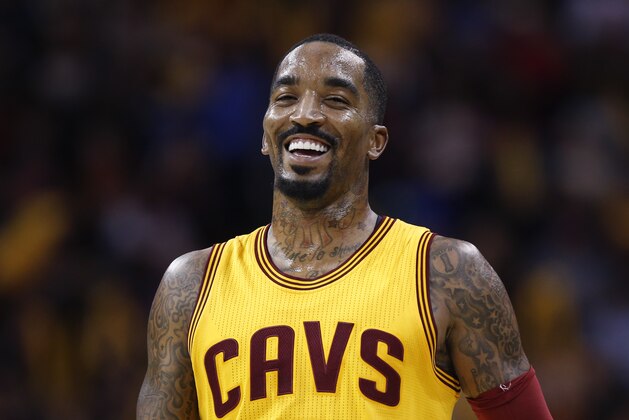 Cleveland Cavaliers' J.R. Smith (5) is all smiles during the second half of an NBA basketball game against the Dallas Mavericks Friday, Nov. 25, 2016, in Cleveland. The Cavaliers won 128-90. (AP Photo/Ron Schwane)