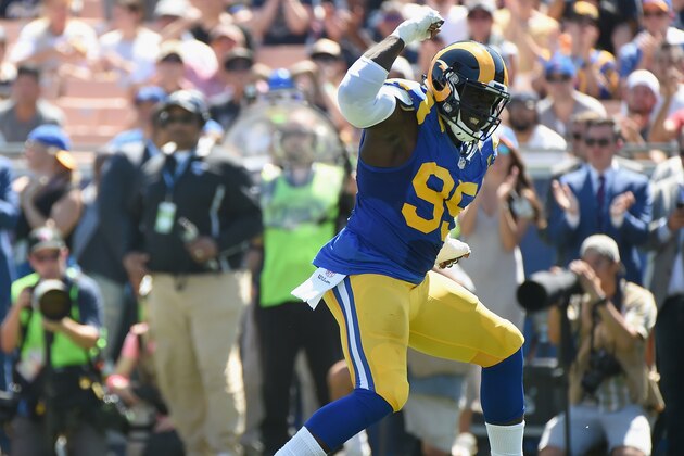 LOS ANGELES, CA - SEPTEMBER 18:  William Hayes #95 of the Los Angeles Rams celebrates a stop for a loss during the first quarter of the home opening NFL game against the Seattle Seahawks at Los Angeles Coliseum on September 18, 2016 in Los Angeles, California.  (Photo by Harry How/Getty Images)