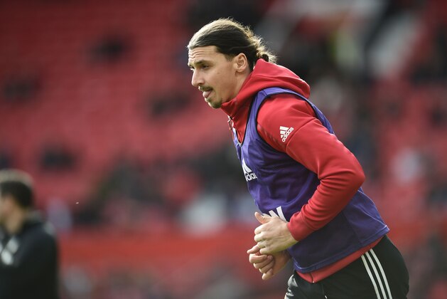 Manchester United's Swedish striker Zlatan Ibrahimovic warms up ahead of the English Premier League football match between Manchester United and Bournemouth at Old Trafford in Manchester, north west England, on March 4, 2017. / AFP PHOTO / Oli SCARFF / RESTRICTED TO EDITORIAL USE. No use with unauthorized audio, video, data, fixture lists, club/league logos or 'live' services. Online in-match use limited to 75 images, no video emulation. No use in betting, games or single club/league/player publications.  /         (Photo credit should read OLI SCARFF/AFP/Getty Images)