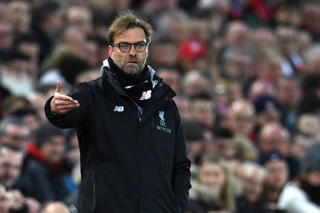 Liverpool's German manager Jurgen Klopp gestures on the touchline during the English Premier League football match between Liverpool and Arsenal at Anfield in Liverpool, north west England on March 4, 2017.  / AFP PHOTO / Paul ELLIS / RESTRICTED TO EDITORIAL USE. No use with unauthorized audio, video, data, fixture lists, club/league logos or 'live' services. Online in-match use limited to 75 images, no video emulation. No use in betting, games or single club/league/player publications.  /         (Photo credit should read PAUL ELLIS/AFP/Getty Images)