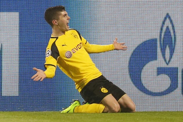 Dortmund's Christian Pulisic celebrates after scoring his side's second goal during the Champions League round of 16, second leg, soccer match between Borussia Dortmund and Benfica in Dortmund, Germany, Wednesday, March 8, 2017. (AP Photo/Michael Probst)