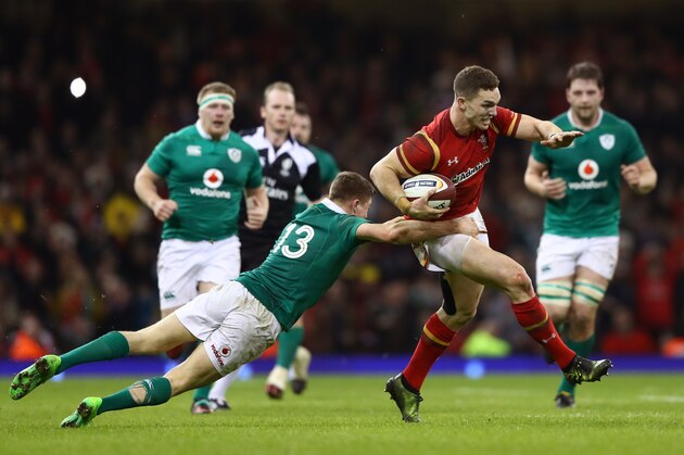 CARDIFF, WALES - MARCH 10:  George North of Wales evades a tackle by Garry Ringrose of Ireland during the Six Nations match between Wales and Ireland at the Principality Stadium on March 10, 2017 in Cardiff, Wales.  (Photo by Michael Steele/Getty Images)