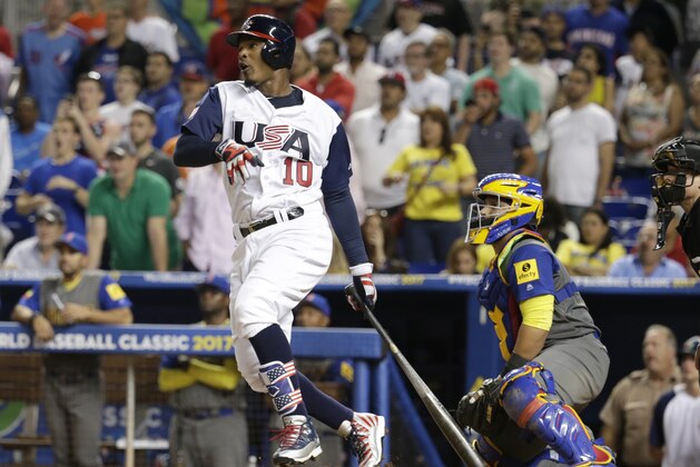 United States' Adam Jones watches his game-winning single that scored Christian Yelich during the 10th inning against Colombia in a first-round game of the World Baseball Classic, Friday, March 10, 2017, in Miami. At right is Colombia catcher Jhonatan Solano. The U.S. won 3-2. (AP Photo/Lynne Sladky) United States' Adam Jones watches his game-winning single that scored Christian Yelich during the 10th inning against Colombia in a first-round game of the World Baseball Classic, Friday, March 10, 2017, in Miami. At right is Colombia catcher Jhonatan Solano. The U.S. won 3-2. (AP Photo/Lynne Sladky)