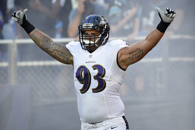 Baltimore Ravens defensive end Lawrence Guy takes the field before an NFL preseason football game against the Carolina Panthers, Thursday, Aug. 11, 2016, in Baltimore. (AP Photo/Nick Wass)