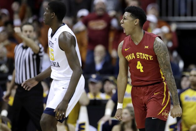 Iowa State's Donovan Jackson celebrates after making a basket during the first half of the team's NCAA college basketball game against West Virginia for the championship of the Big 12 tournament in Kansas City, Mo., Saturday, March 11, 2017. (AP Photo/Charlie Riedel)