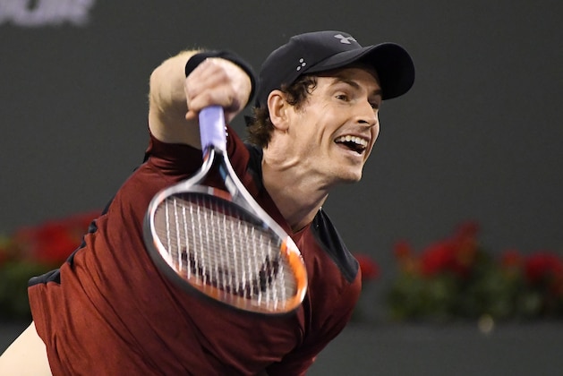 Andy Murray, of Great Britain, serves to Vasek Pospisil, of Canada, at the BNP Paribas Open tennis tournament, Saturday, March 11, 2017, in Indian Wells, Calif. Pospisil won the match 6-4, 7-6 (5). (AP Photo/Mark J. Terrill)