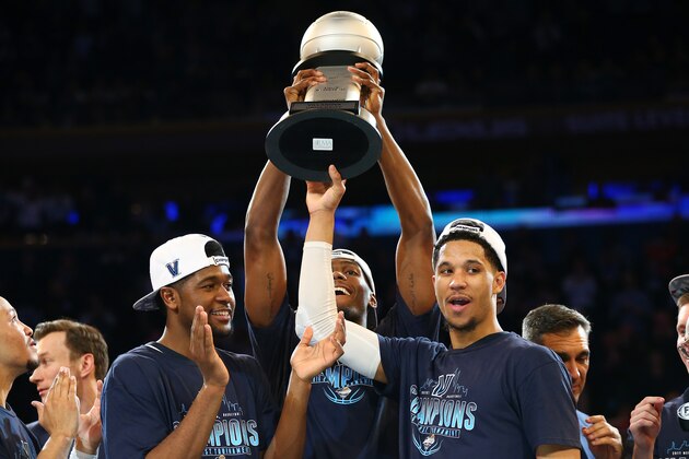 NEW YORK, NY - MARCH 11:  Josh Hart #3, Kris Jenkins #2 and Darryl Reynolds #45 of the Villanova Wildcats celebrate after defeating the Creighton Bluejays to win the Big East Basketball Tournament - Championship Game at Madison Square Garden on March 11, 2017 in New York City.  (Photo by Mike Stobe/Getty Images)