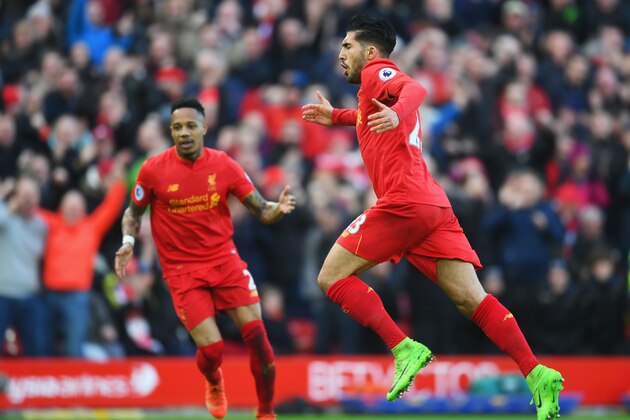 LIVERPOOL, ENGLAND - MARCH 12:  Emre Can (23) of Liverpool celebrates with Nathaniel Clyne as he as he scores their second goal during the Premier League match between Liverpool and Burnley at Anfield on March 12, 2017 in Liverpool, England.  (Photo by Michael Regan/Getty Images)