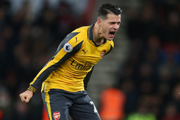 BOURNEMOUTH, ENGLAND - JANUARY 03: Granit Xhaka of Arsenal celebrates during the Premier League match between AFC Bournemouth and Arsenal at Vitality Stadium on January 3, 2017 in Bournemouth, England. (Photo by Catherine Ivill - AMA/Getty Images)