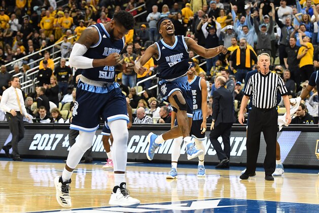 PITTSBURGH, PA - MARCH 12:  Stanford Robinson #13 of the Rhode Island Rams celebrates after defeating the Virginia Commonwealth Rams 70-63 during the championship game of the Atlantic 10 Basketball Tournament at PPG PAINTS Arena on March 12, 2017 in Pittsburgh, Pennsylvania. (Photo by Joe Sargent/Getty Images)
