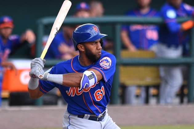 LAKELAND, FL - MARCH 12:  Amed Rosario #61 of the New York Mets bats during the Spring Training game against the Detroit Tigers at Publix Field at Joker Marchant Stadium on March 12, 2017 in Lakeland, Florida. The Tigers defeated the Mets 4-3.  (Photo by Mark Cunningham/MLB Photos via Getty Images)