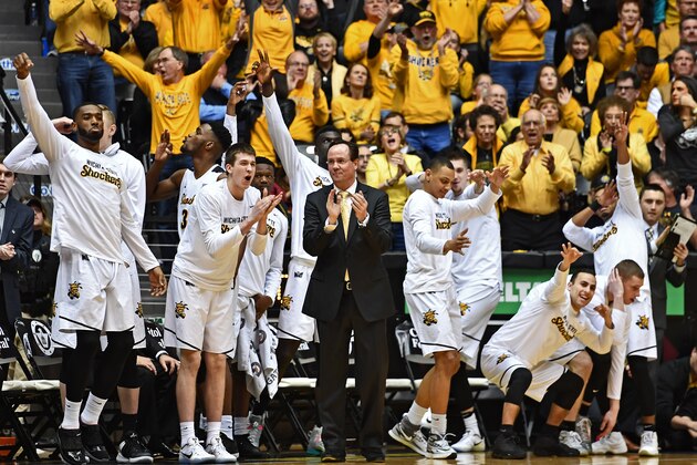 WICHITA, KS - FEBRUARY 04:  Head coach Gregg Marshall (C) of the Wichita State Shockers and the players on the bench react after a score by the Shockers against the Illinois State Redbirds during the second half on February 4, 2017 at Charles Koch Arena in Wichita, Kansas.  Wichita State won 86-45. (Photo by Peter G. Aiken/Getty Images)