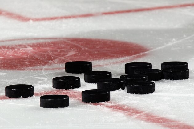 NEWARK, NJ - MARCH 17: Pucks sit on the ice during warmups prior to the game betrween the New Jersey Devils and the Pittsburgh Penguins at the Prudential Center on March 17, 2015 in Newark, New Jersey.  (Photo by Bruce Bennett/Getty Images)