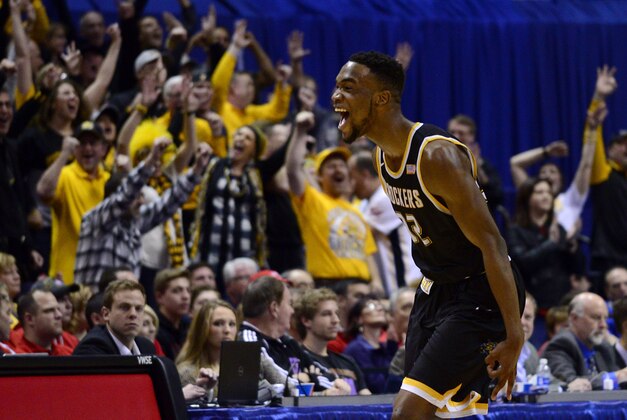 Mar 5, 2017; St. Louis, MO, USA; Wichita State Shockers forward Markis McDuffie (32) celebrates after scoring against the Illinois State Redbirds during the second half of the Championship game of the Missouri Valley Conference Tournament at Scottrade Center. Wichita State won 71-51. Mandatory Credit: Jeff Curry-USA TODAY Sports