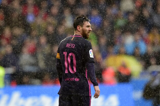 Barcelona's Argentinian forward Lionel Messi looks on during the Spanish league footbal match RC Deportivo de la Coruna vs FC Barcelona at the Municipal de Riazor stadium in La Coruna on March 12, 2017. / AFP PHOTO / MIGUEL RIOPA        (Photo credit should read MIGUEL RIOPA/AFP/Getty Images)